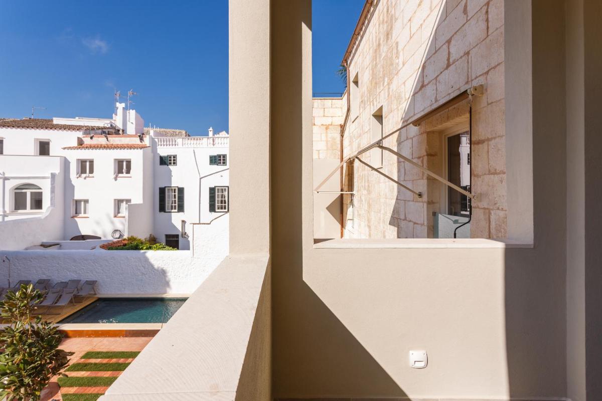 una vista desde el balcón de una casa en Bordoy Casa Ládico - Hotel Boutique Adults Only, en Mahón