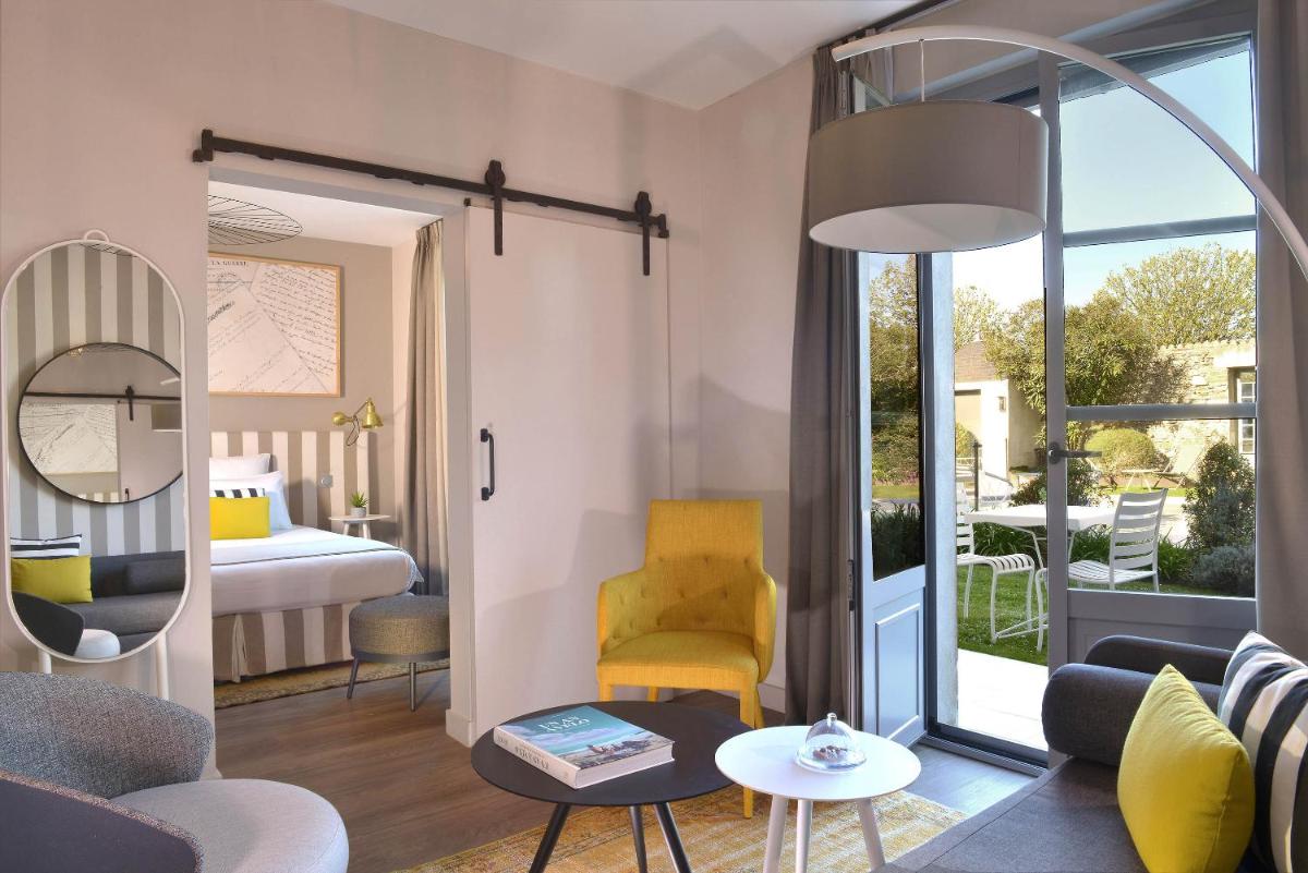 Un ou plusieurs lits dans un hébergement de l'établissement Le Général d'Elbée Hotel & Spa - Teritoria