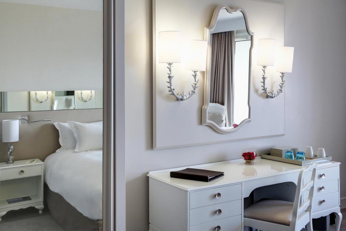 Un ou plusieurs lits dans un hébergement de l'établissement Sofitel Golfe d'Ajaccio Thalassa Sea & Spa
