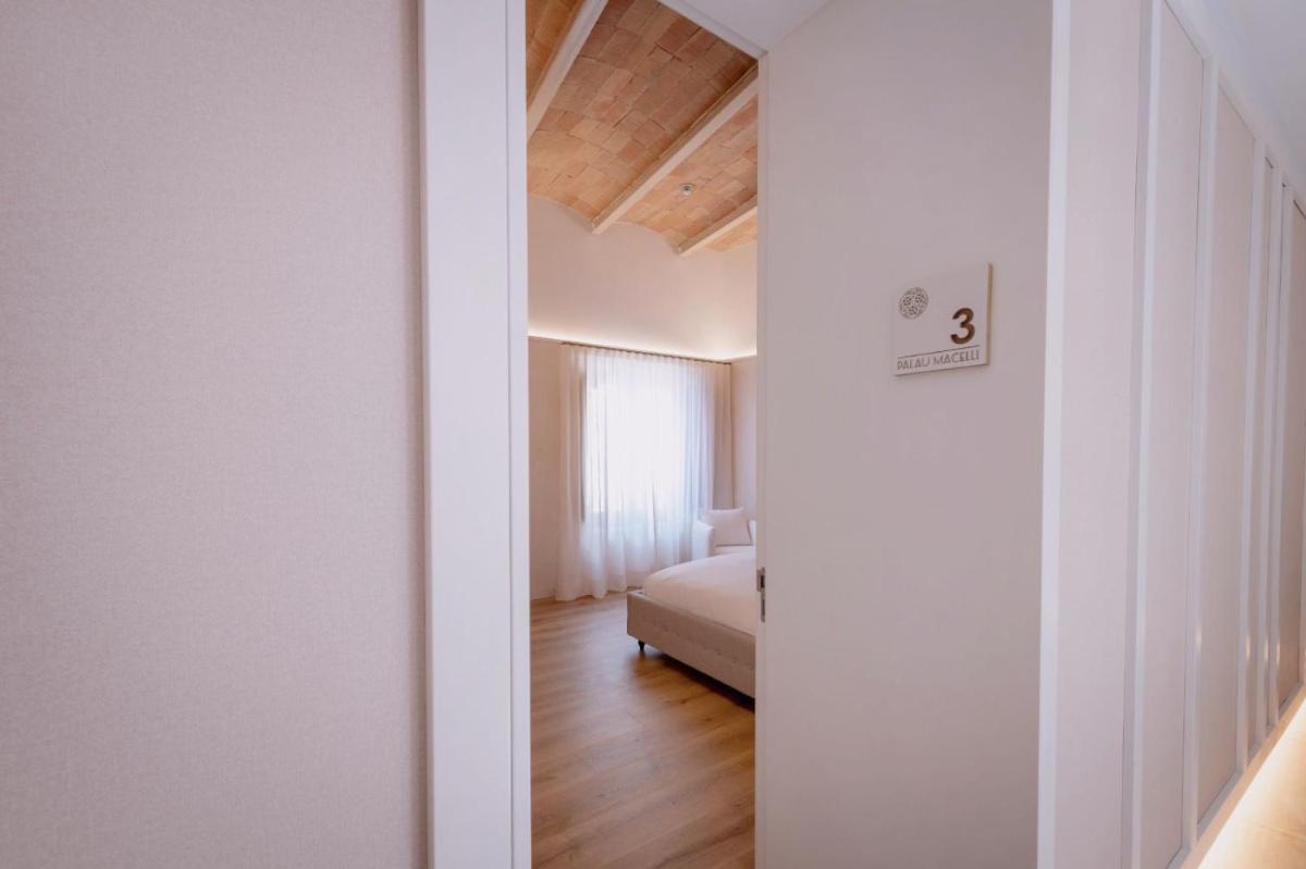 Cama o camas de una habitación en Hotel Palau Macelli & Spa