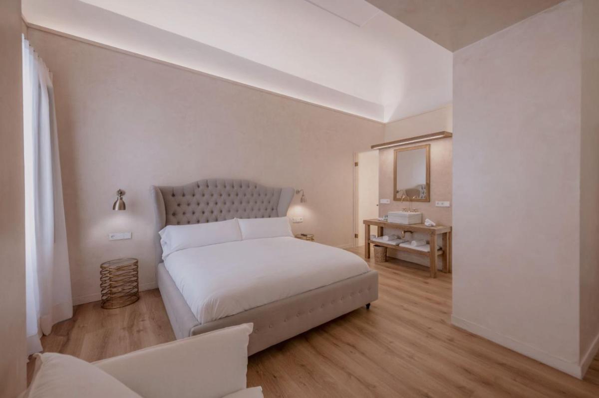 Cama o camas de una habitación en Hotel Palau Macelli & Spa