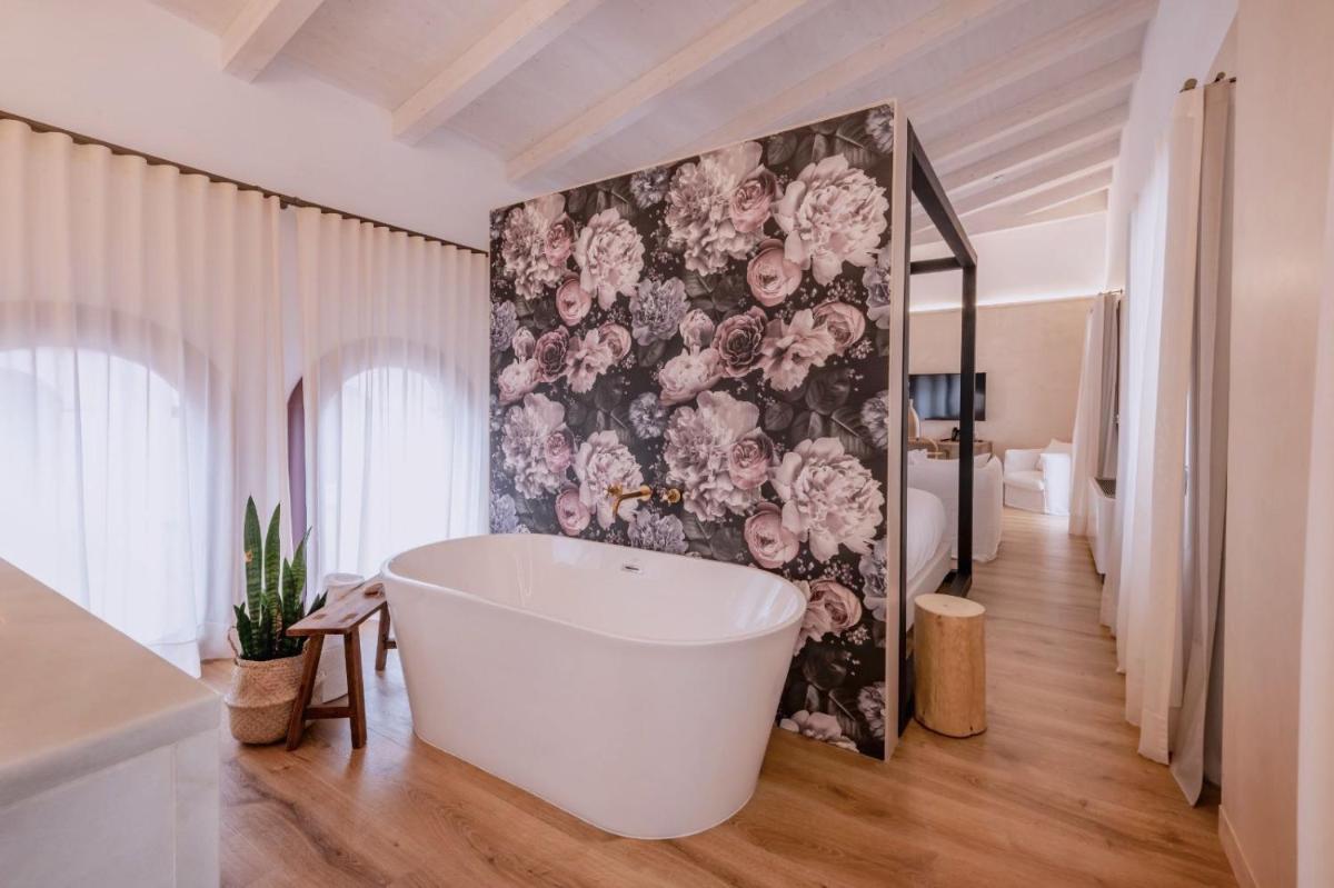 Un baño de Hotel Palau Macelli & Spa