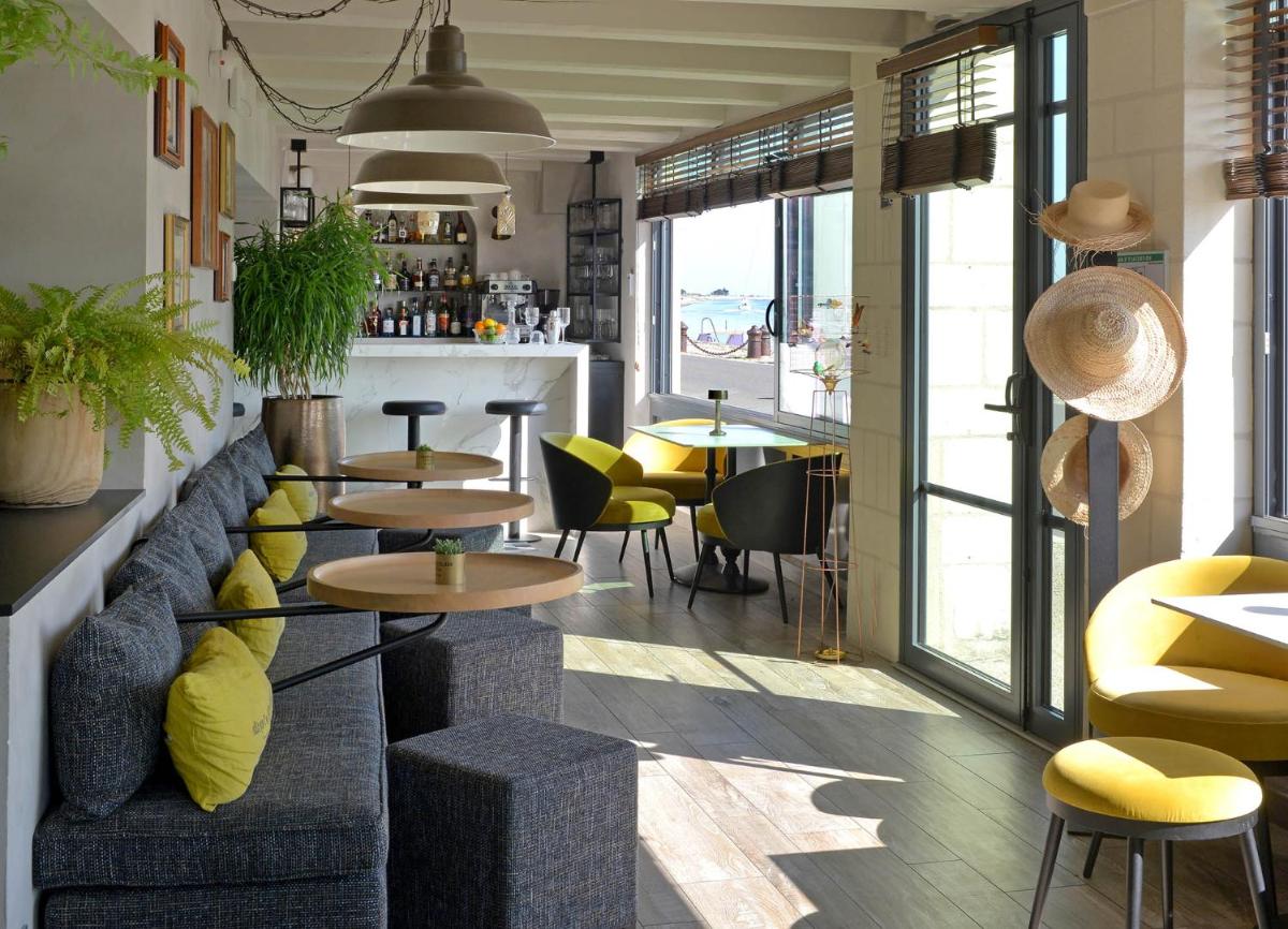 Coin salon dans l'établissement Le Général d'Elbée Hotel & Spa - Teritoria