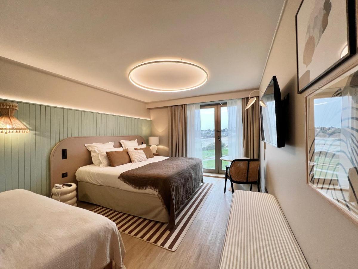 Un ou plusieurs lits dans un hébergement de l'établissement Emeria Dinard Thalasso Spa