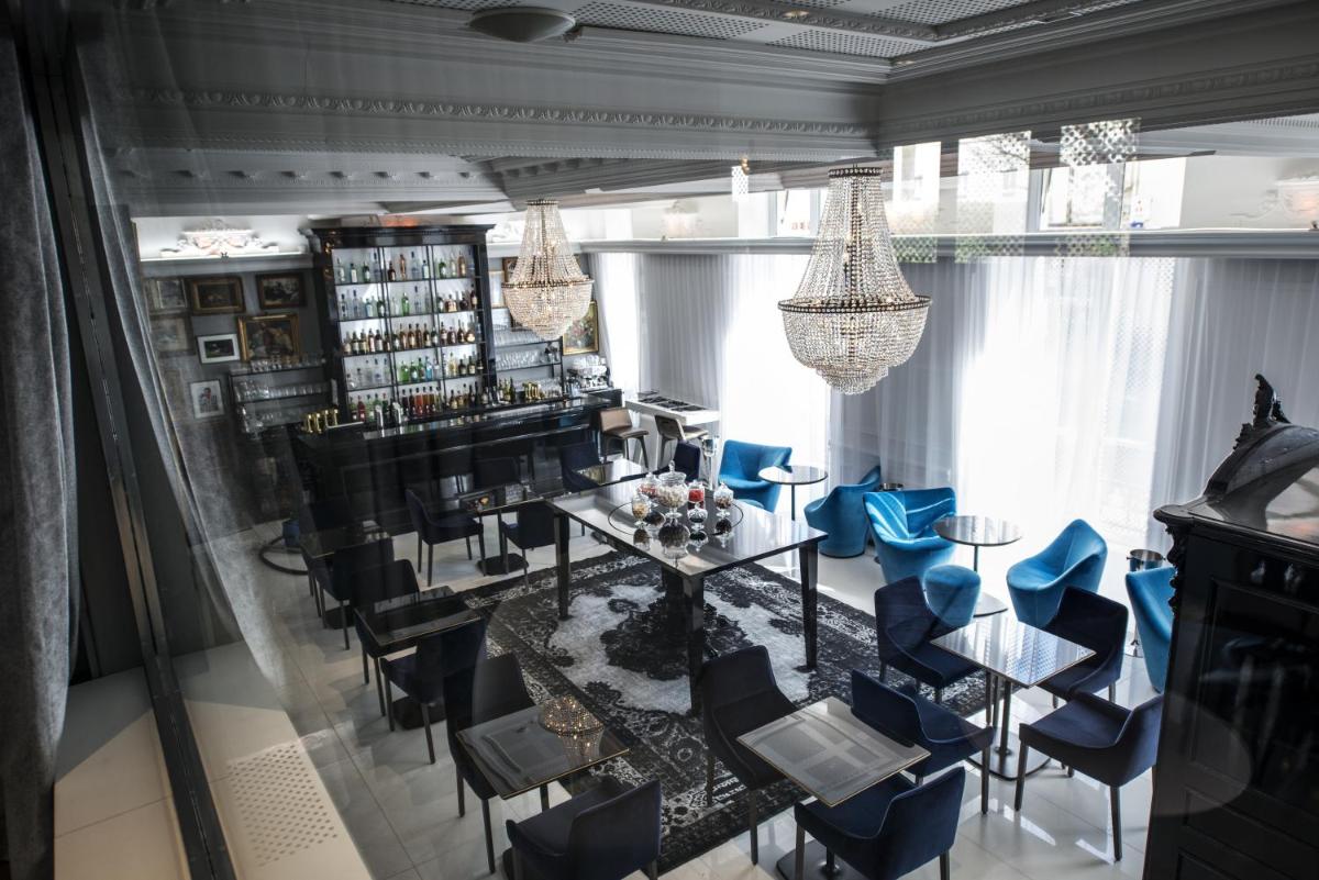 Coin salon dans l'établissement Vertigo Hotel, By Marriott, a Member of Design Hotels