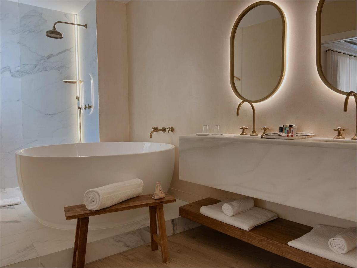 Un baño de Hotel Palau Macelli & Spa