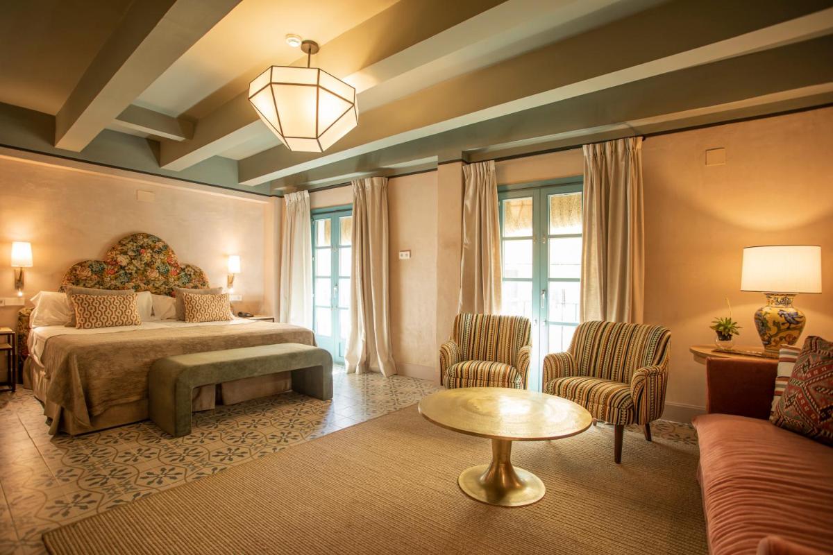 Cama o camas de una habitación en Hospes Las Casas del Rey de Baeza, a Member of Design Hotels