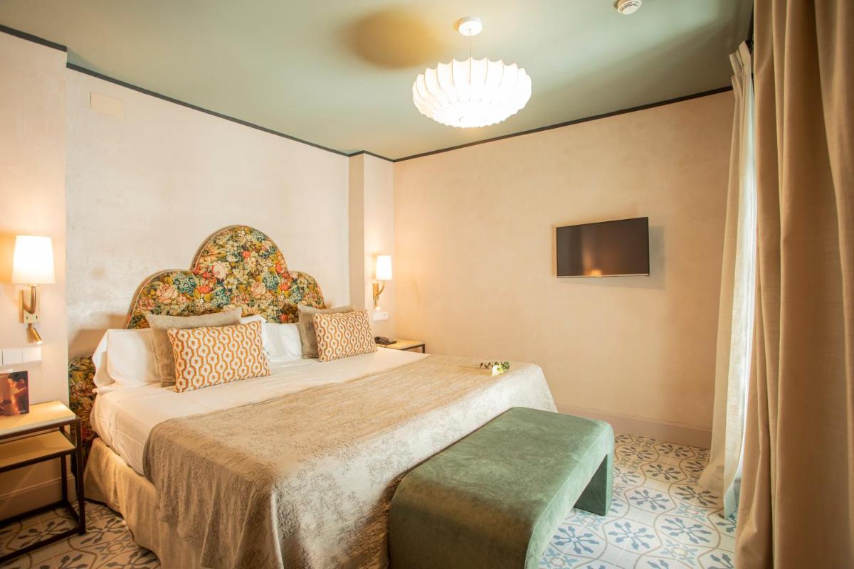 Cama o camas de una habitación en Hospes Las Casas del Rey de Baeza, a Member of Design Hotels