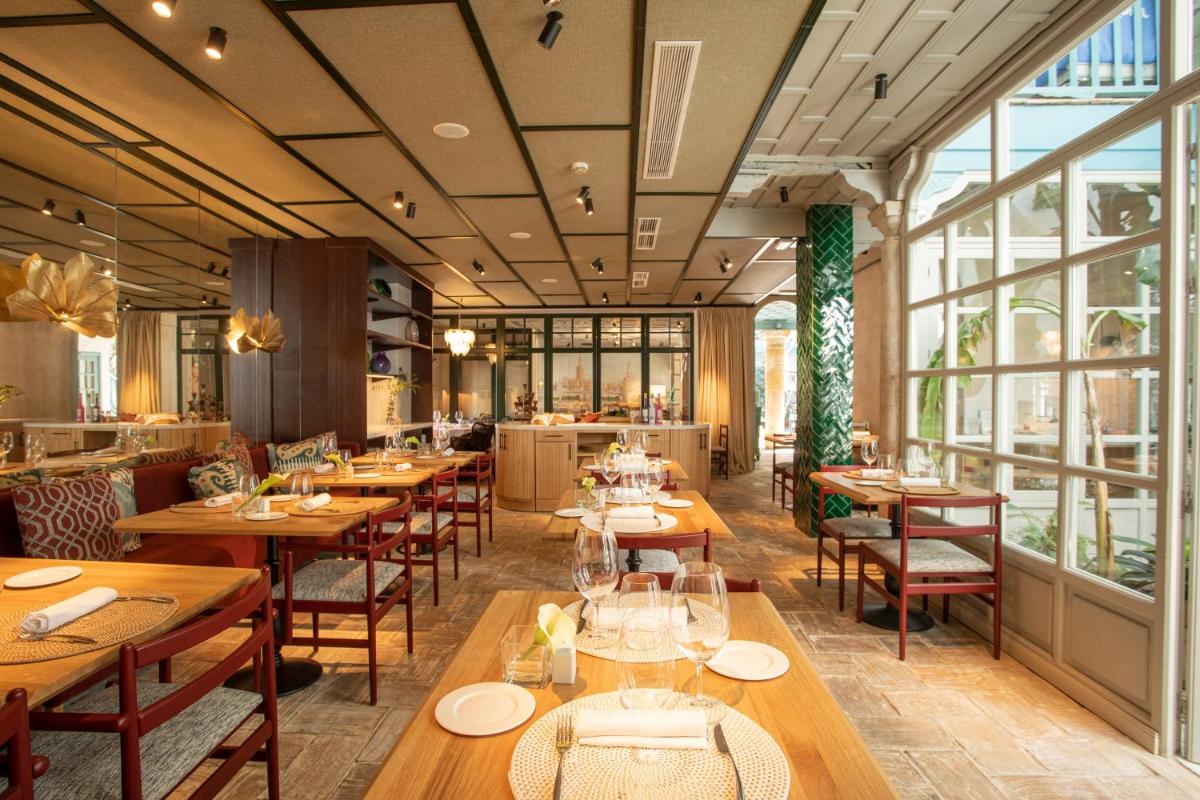 Un restaurante o sitio para comer en Hospes Las Casas del Rey de Baeza, a Member of Design Hotels