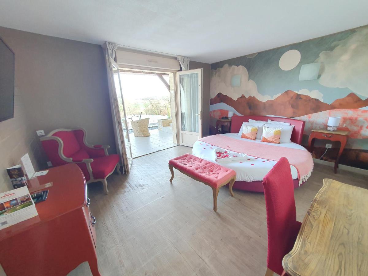 Un ou plusieurs lits dans un hébergement de l'établissement Le Belvédère Hotel et Bien être