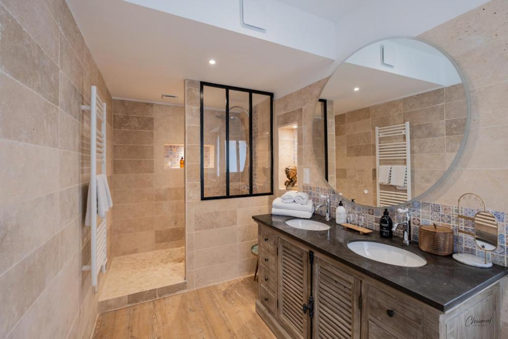 Salle de bains dans l'établissement Le Belvédère Hotel et Bien être