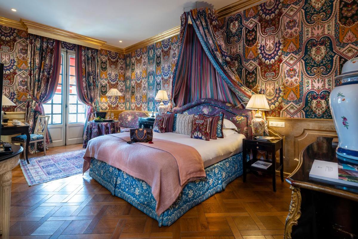 Un ou plusieurs lits dans un hébergement de l'établissement Villa Gallici Hôtel & Spa
