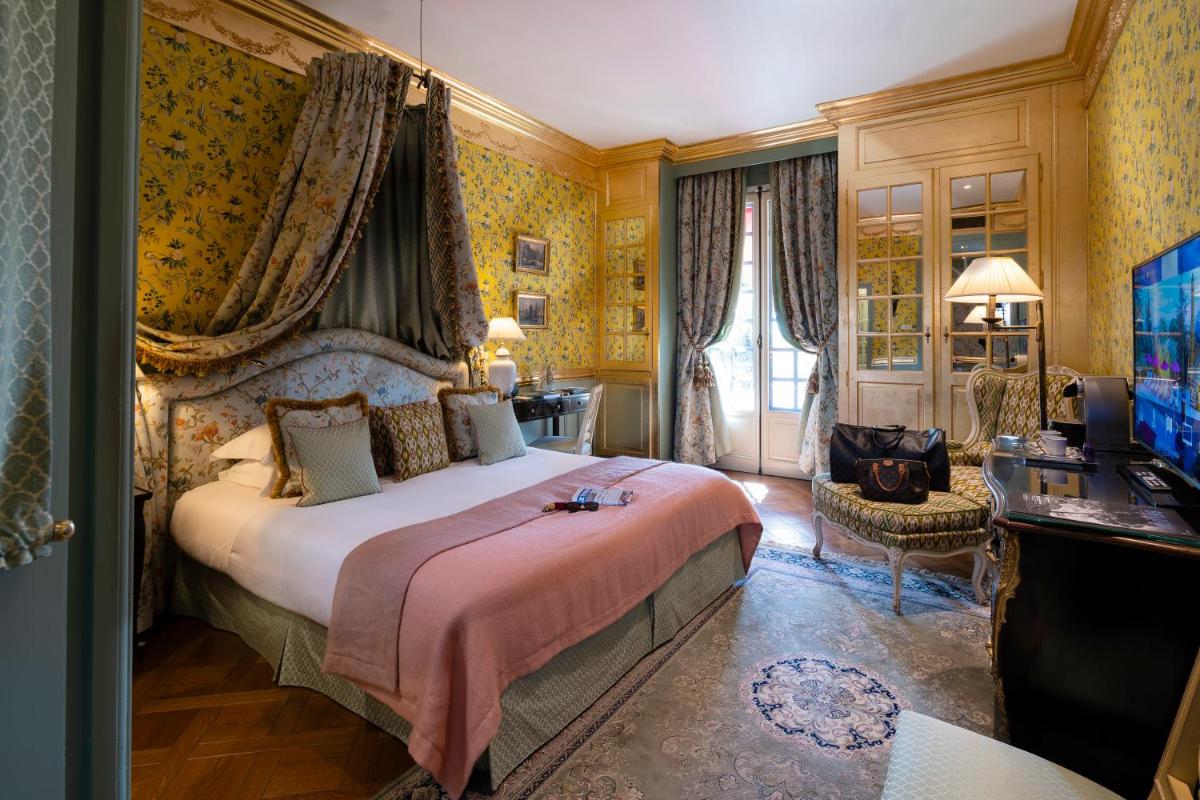 Un ou plusieurs lits dans un hébergement de l'établissement Villa Gallici Hôtel & Spa