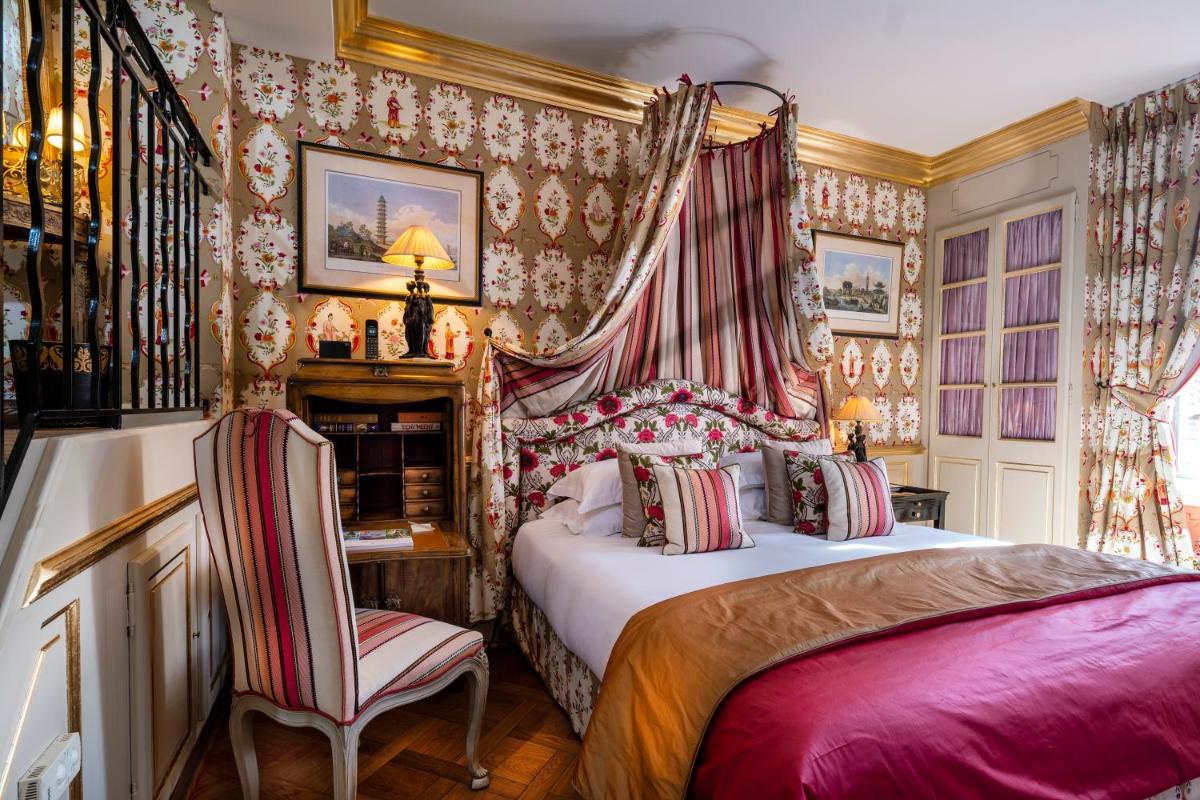 Un ou plusieurs lits dans un hébergement de l'établissement Villa Gallici Hôtel & Spa
