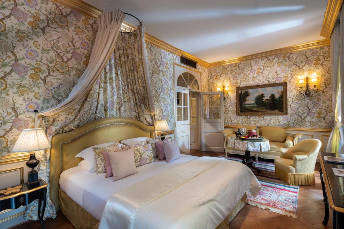 Un ou plusieurs lits dans un hébergement de l'établissement Villa Gallici Hôtel & Spa