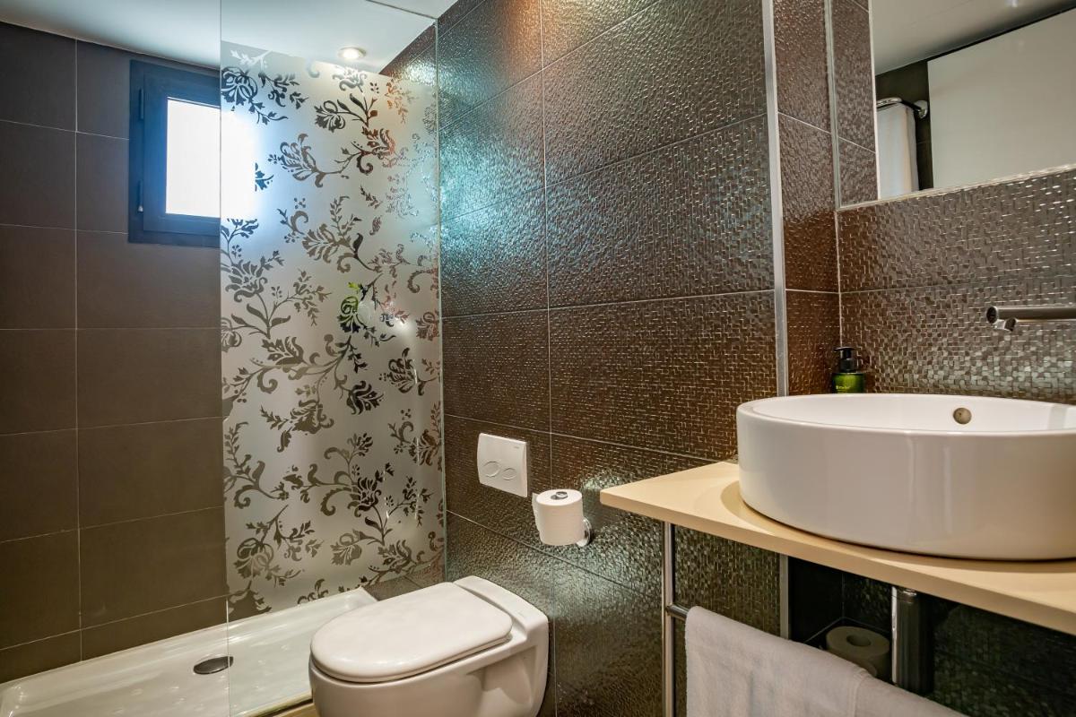 Un baño de Migjorn Ibiza Suites & Spa