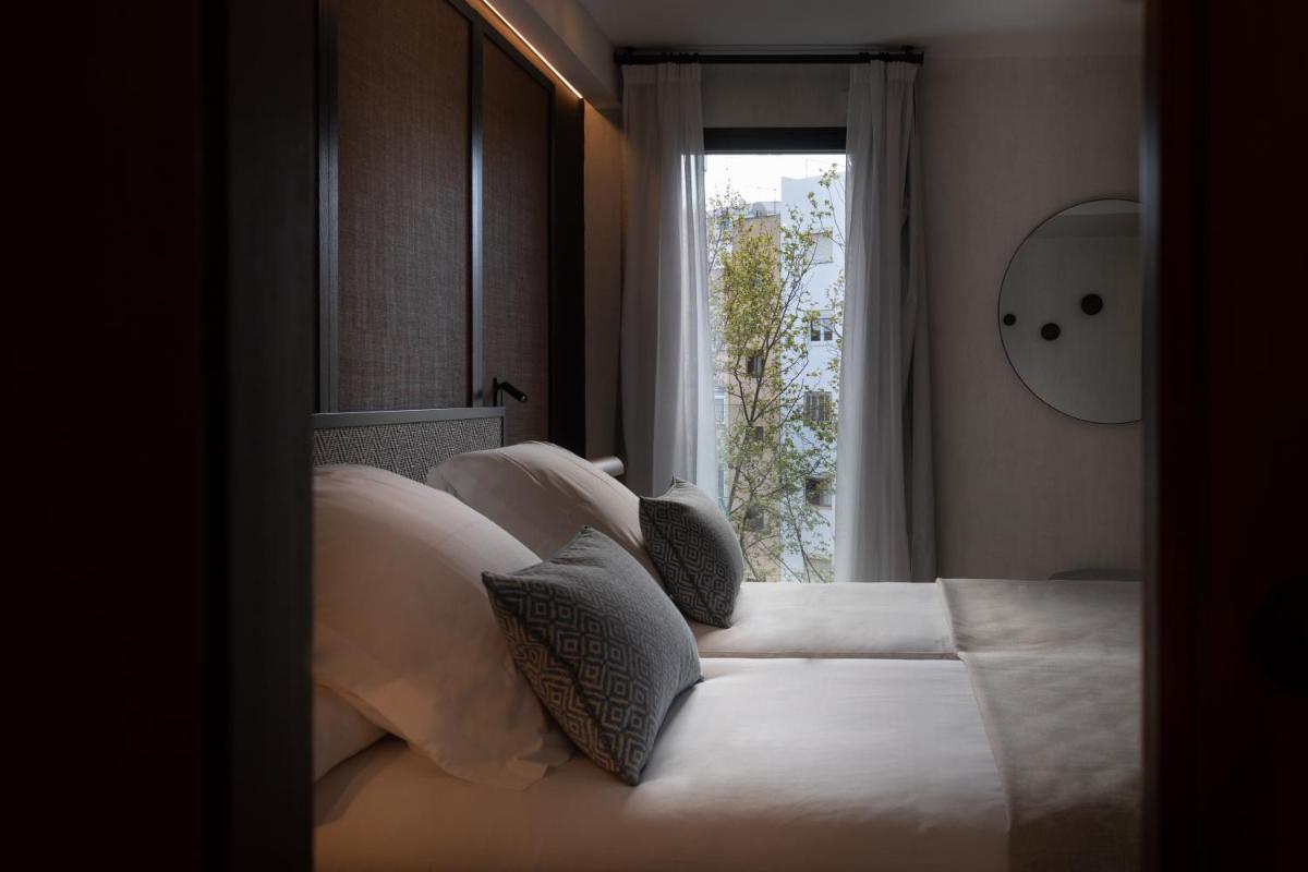 Cama o camas de una habitación en JS Palma Plaza
