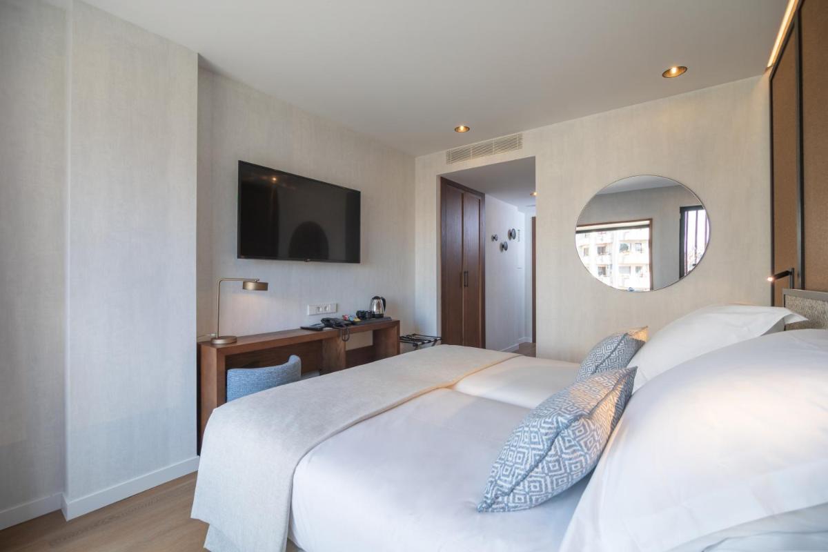 Cama o camas de una habitación en JS Palma Plaza