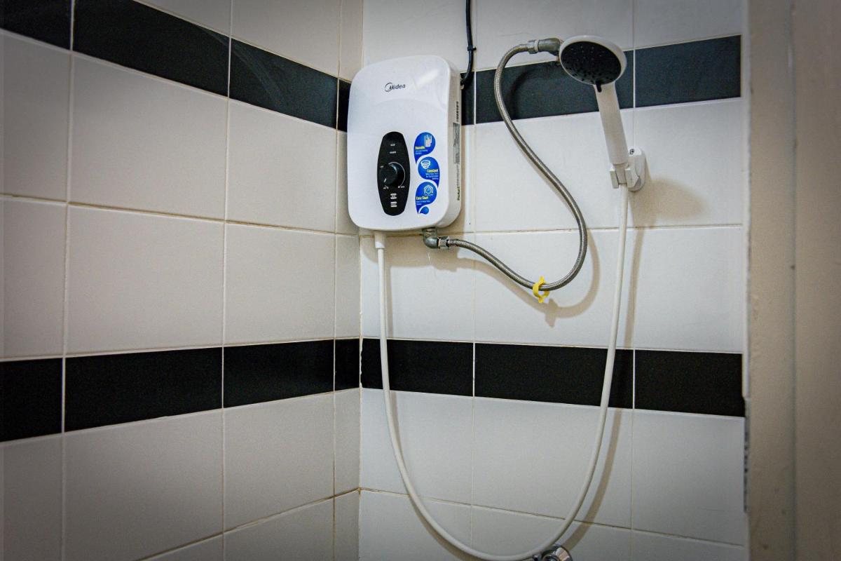 Upspot Kuching Waterfront Premium Hostel - Hizvo