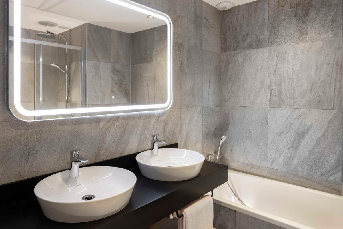 Salle de bains dans l'établissement HIGALIK HOTEL