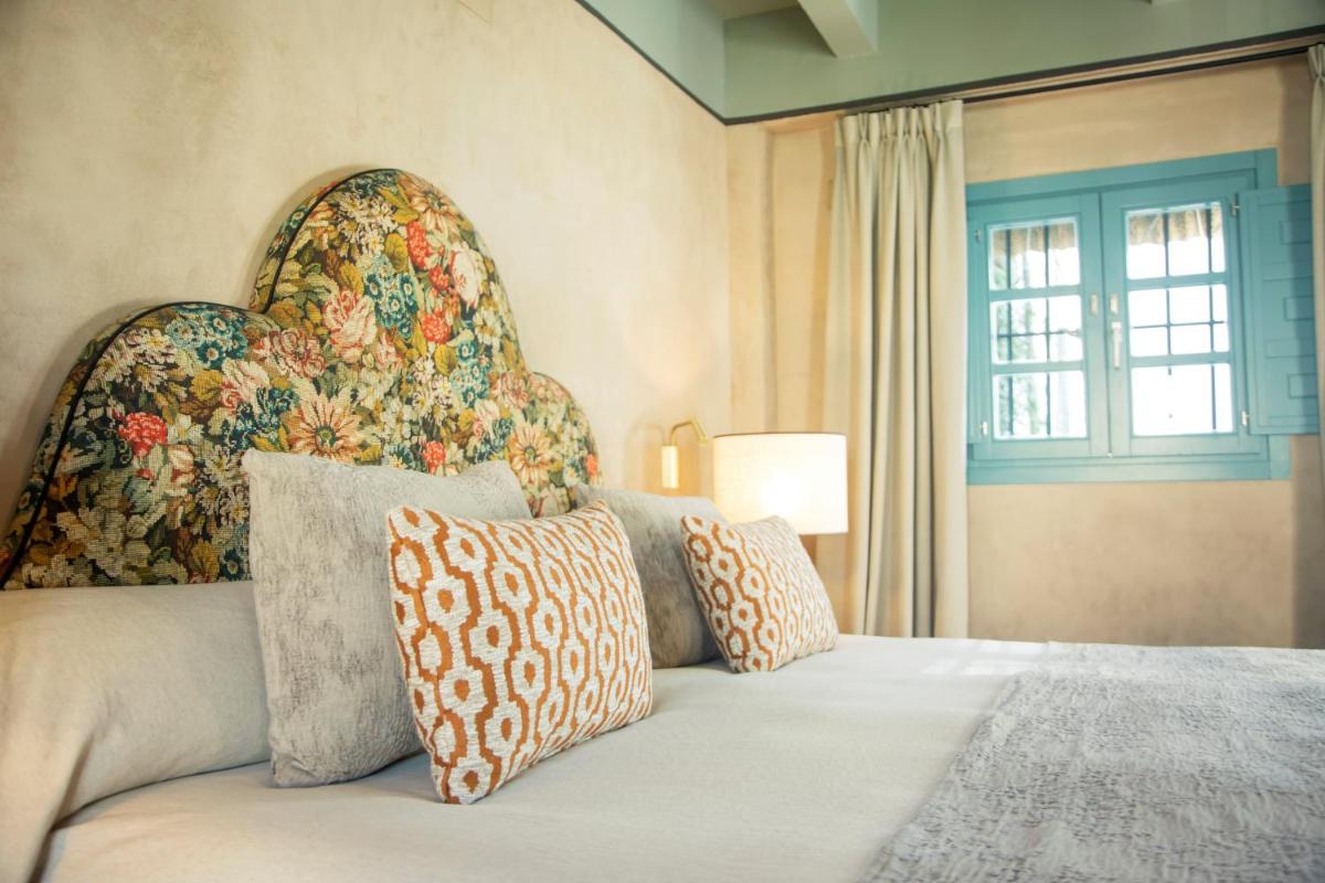 Cama o camas de una habitación en Hospes Las Casas del Rey de Baeza, a Member of Design Hotels