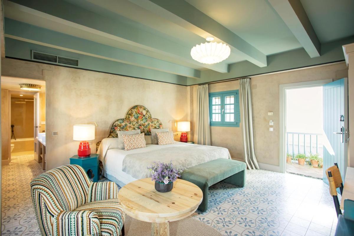 Cama o camas de una habitación en Hospes Las Casas del Rey de Baeza, a Member of Design Hotels