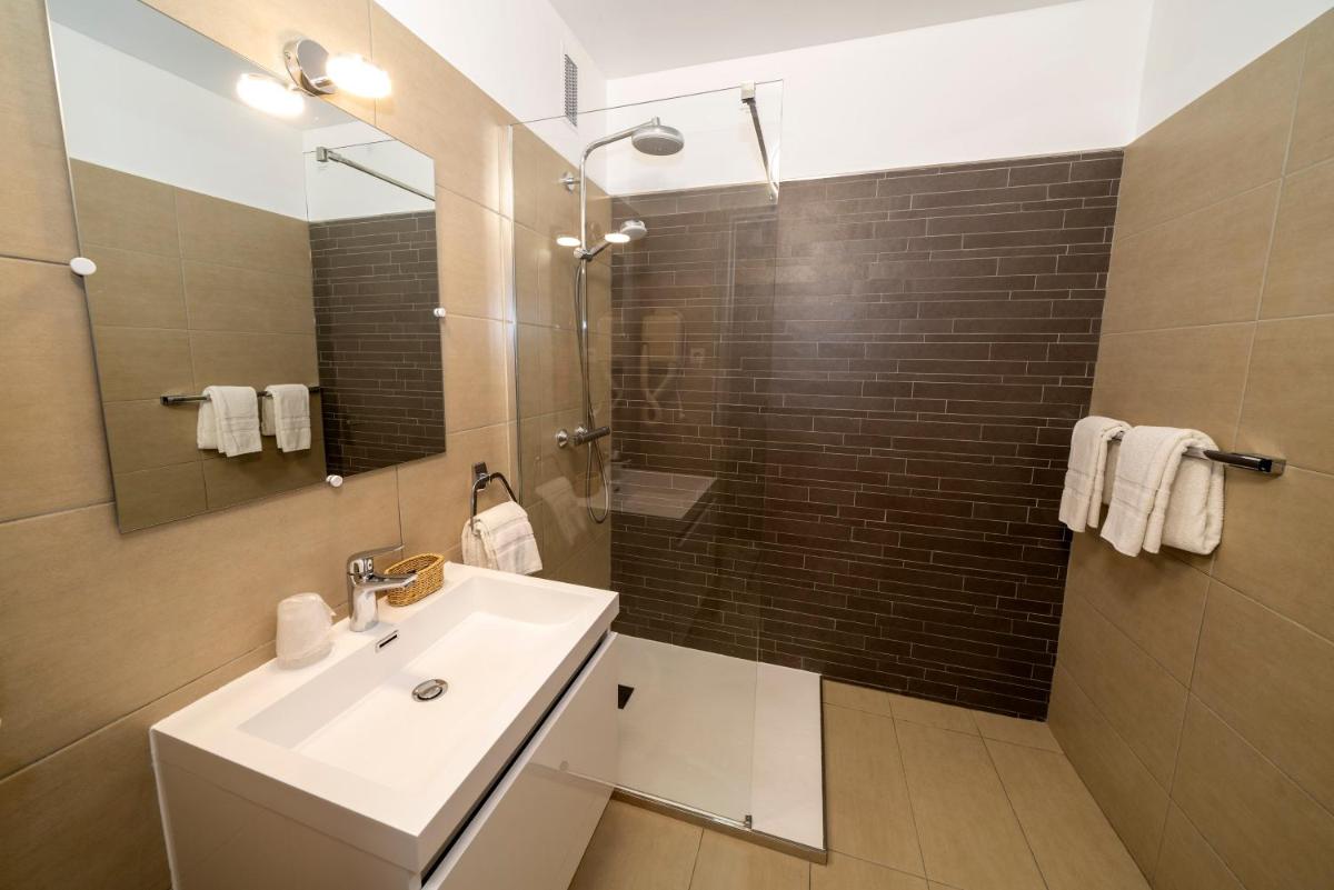 Salle de bains dans l'établissement Hotel Munsch Restaurant & Wellness, Colmar Nord - Haut-Koenigsbourg