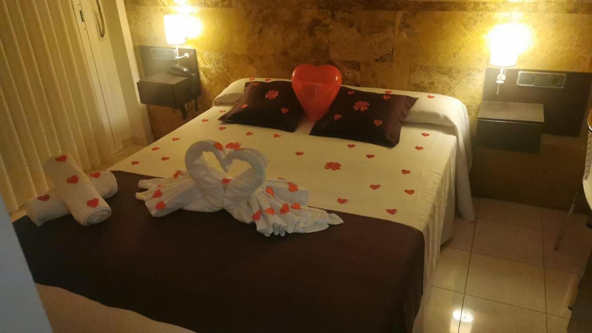 Cama o camas de una habitación en Hotel Spa Pinar del Mar