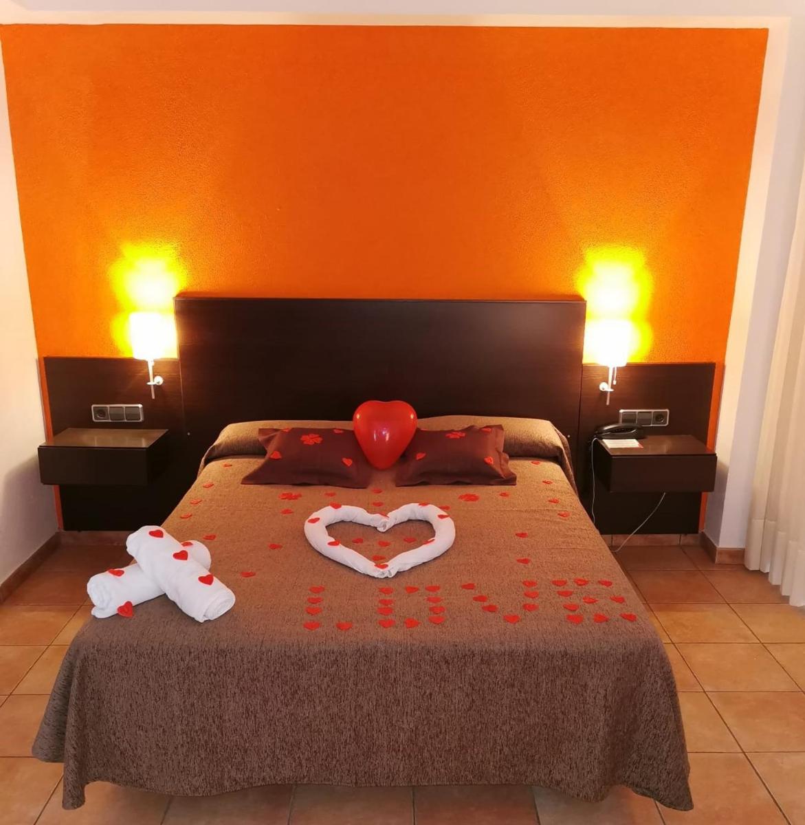 Cama o camas de una habitación en Hotel Spa Pinar del Mar