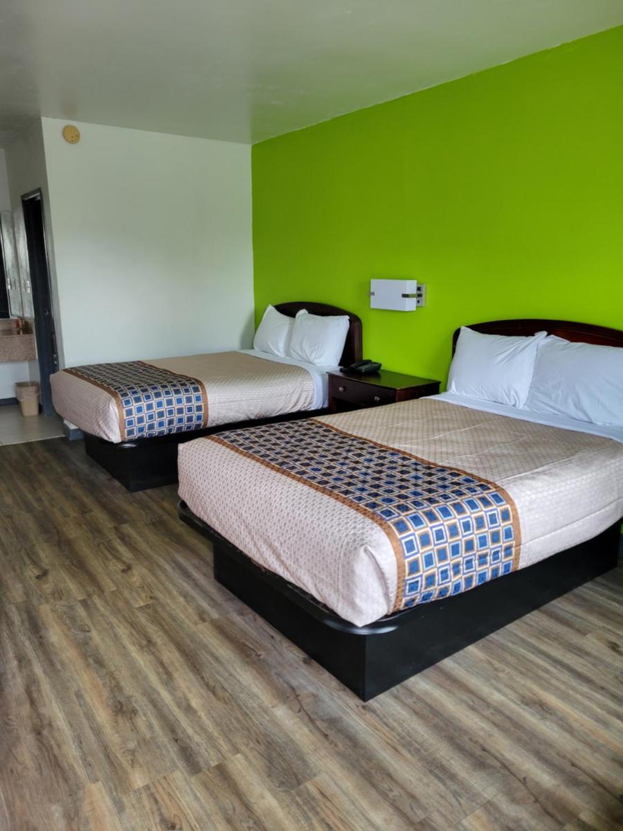 Suitetrails - Zainee Inc Budgetel Inn and Suites
