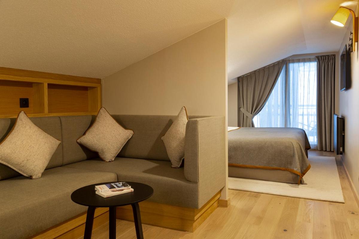 Coin salon dans l'établissement Heliopic Hotel & Spa