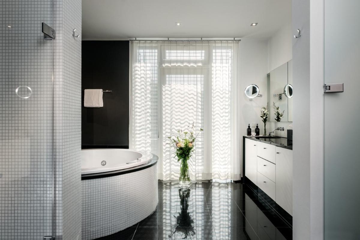 Ein Badezimmer in der Unterkunft Maison Messmer - ein Mitglied der Hommage Luxury Hotels Collection