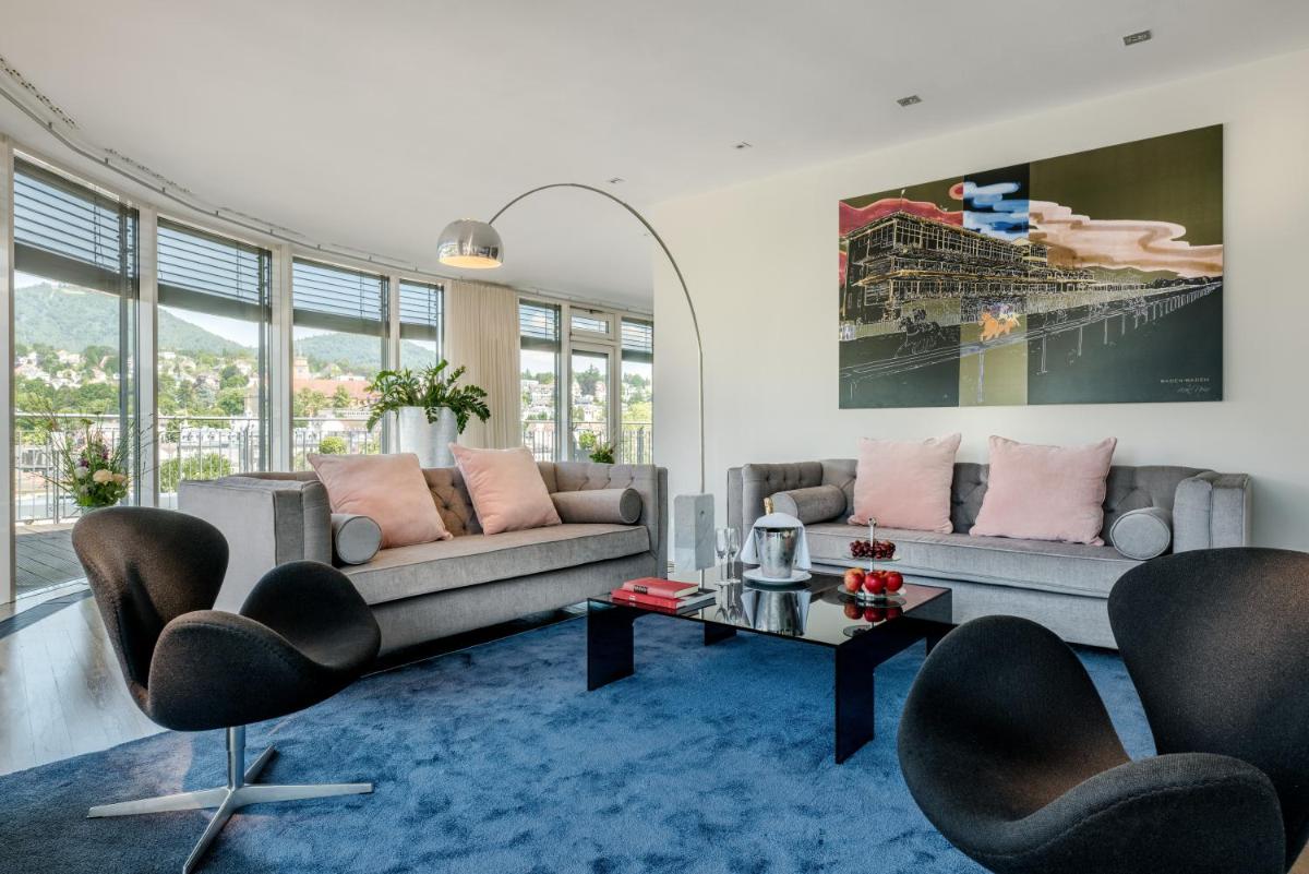 Ein Sitzbereich in der Unterkunft Maison Messmer - ein Mitglied der Hommage Luxury Hotels Collection