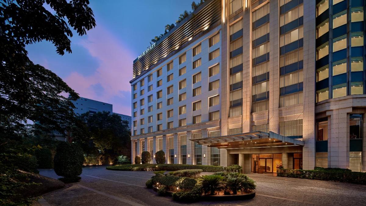 a large building with a courtyard in front of it at Park Hyatt Chennai in Chennai