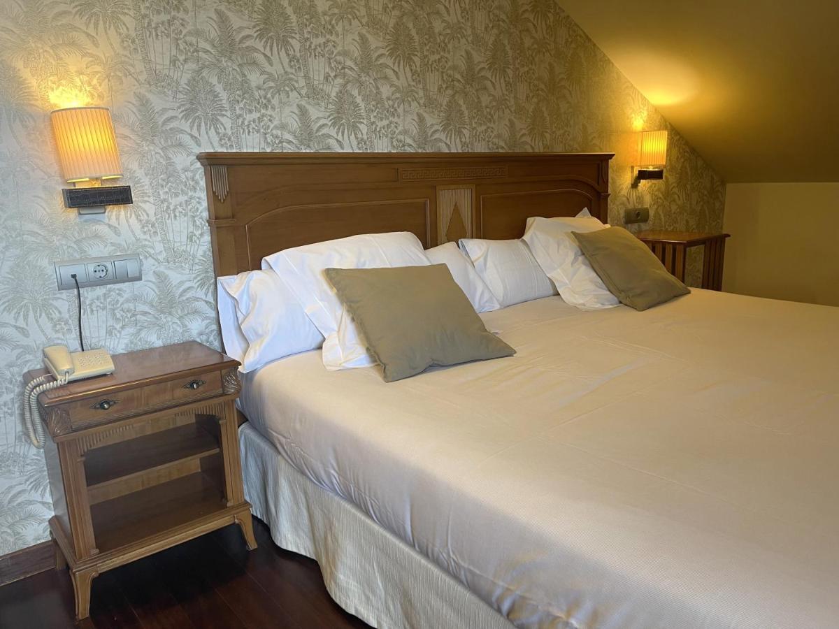 Cama o camas de una habitación en Hosteria de Torazo Nature Hotel & Spa