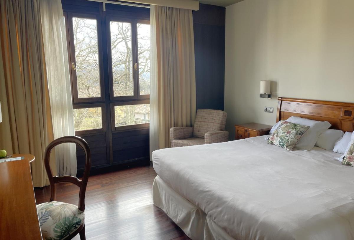 Cama o camas de una habitación en Hosteria de Torazo Nature Hotel & Spa