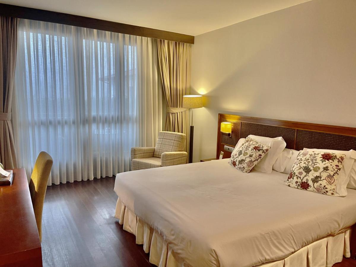 Cama o camas de una habitación en Hosteria de Torazo Nature Hotel & Spa