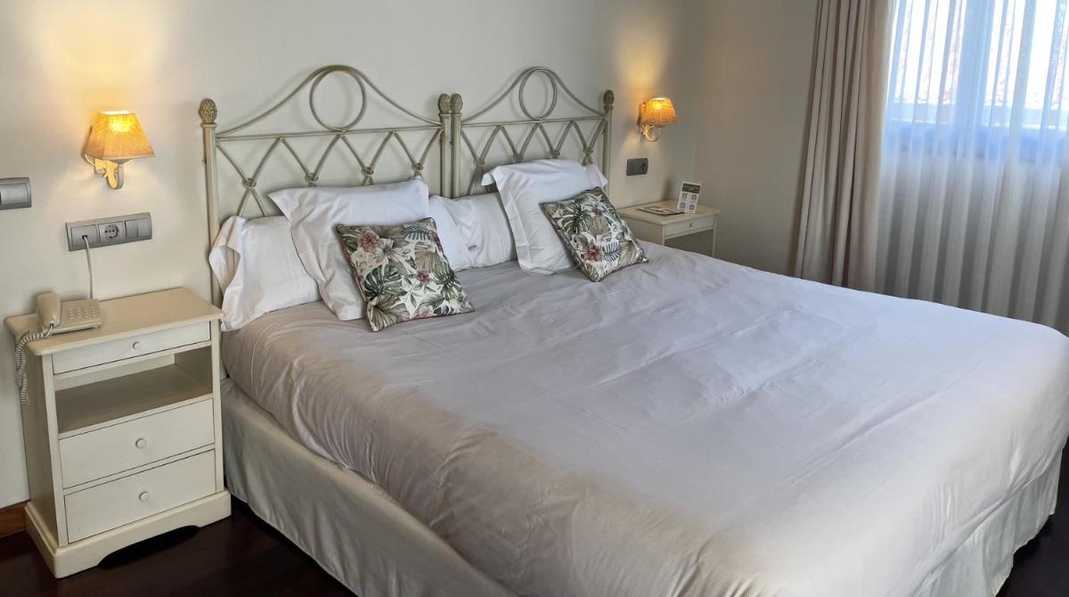 Cama o camas de una habitación en Hosteria de Torazo Nature Hotel & Spa