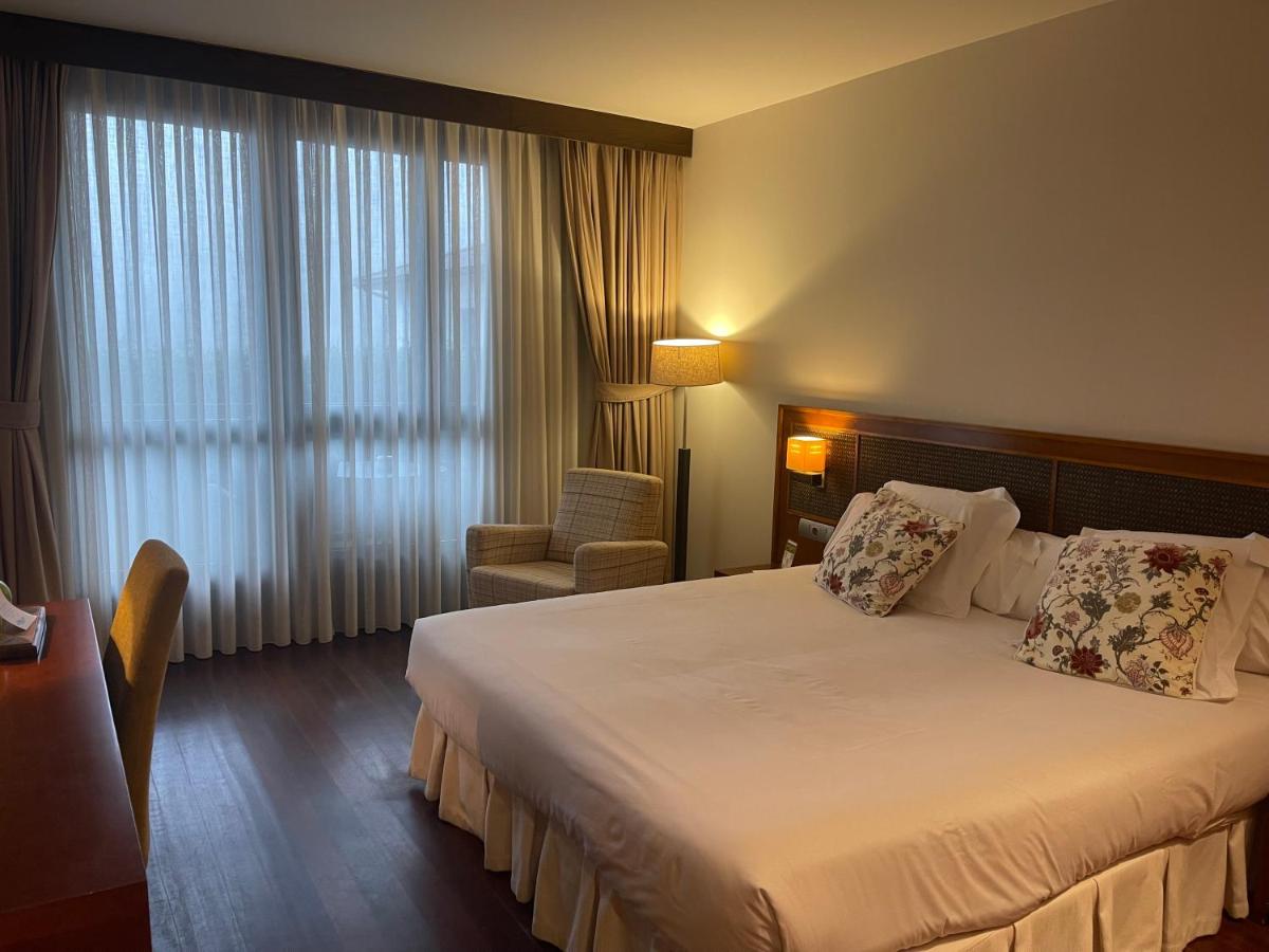 Cama o camas de una habitación en Hosteria de Torazo Nature Hotel & Spa
