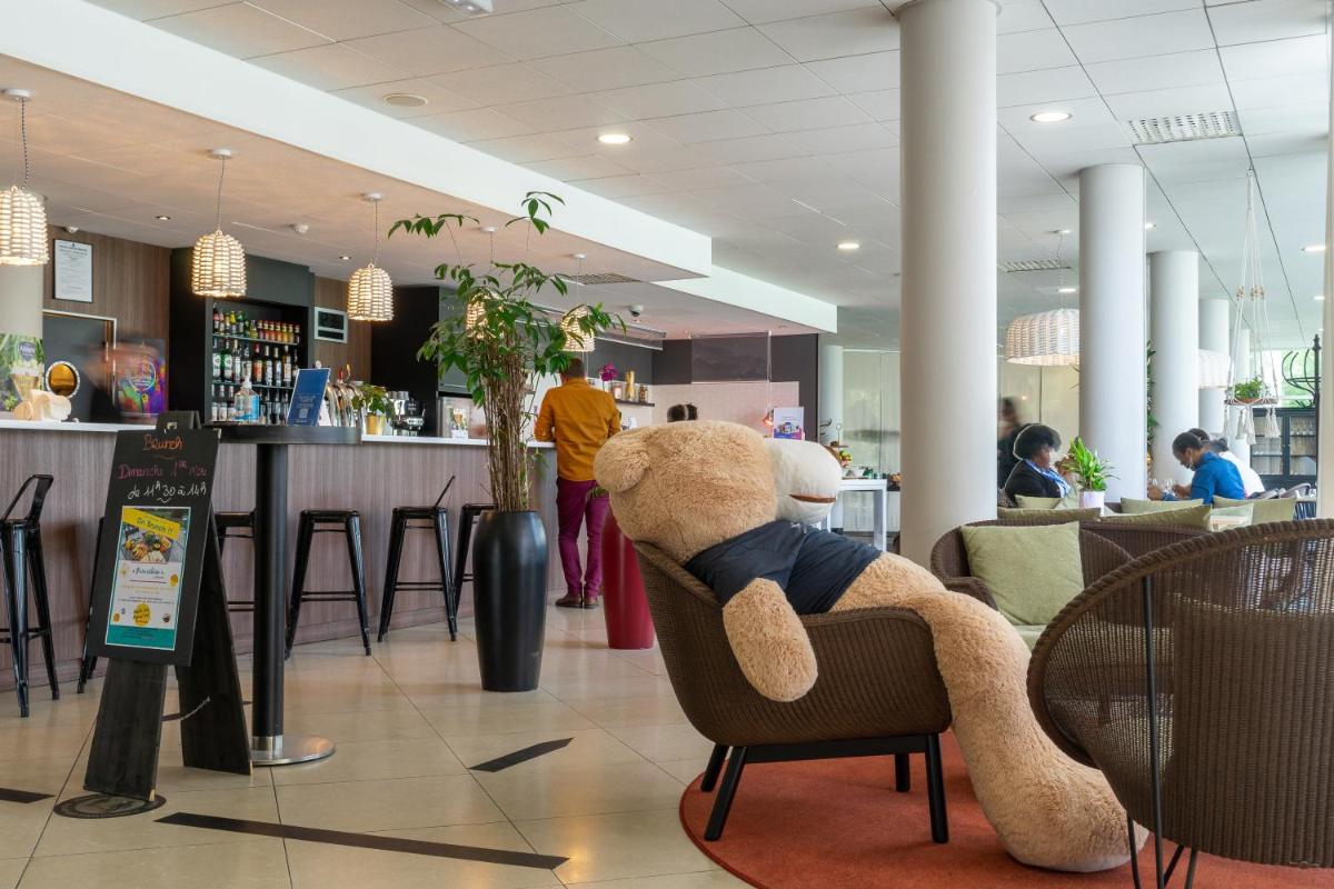 Boissons dans l'établissement Novotel Senart Golf De Greenparc