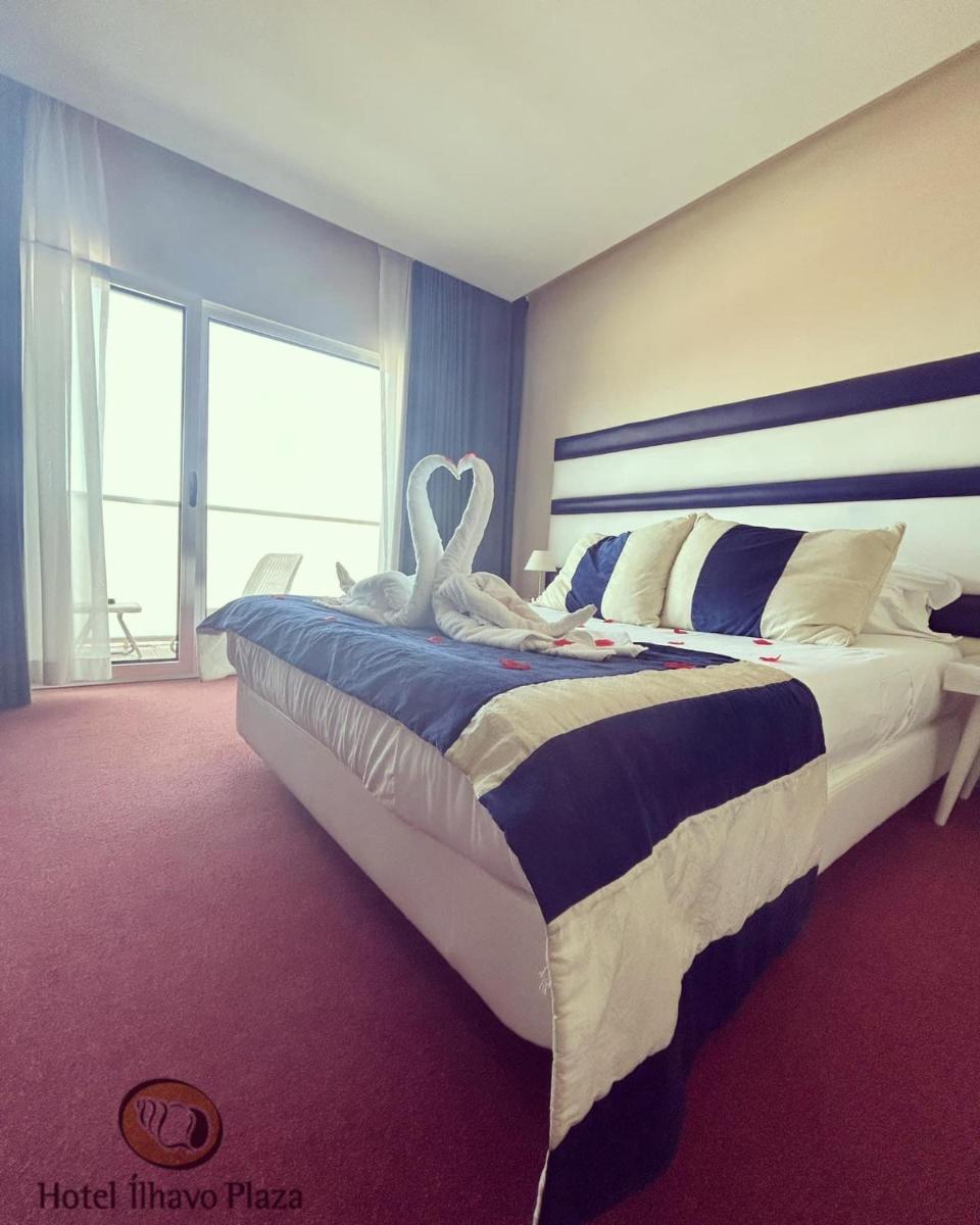 Uma cama ou camas num quarto em Hotel de Ilhavo Plaza & Spa