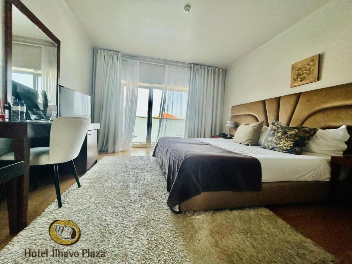 Uma cama ou camas num quarto em Hotel de Ilhavo Plaza & Spa