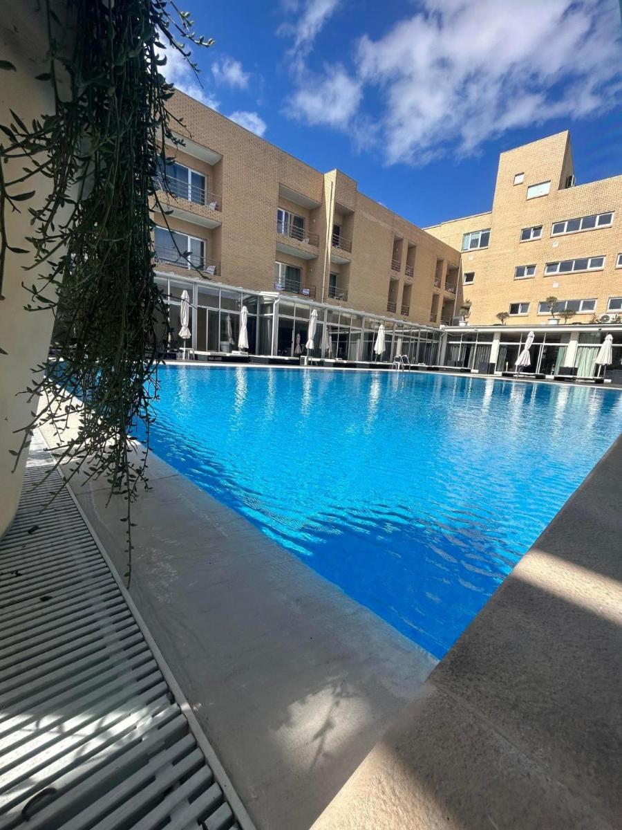 A piscina em ou perto de Hotel de Ilhavo Plaza & Spa