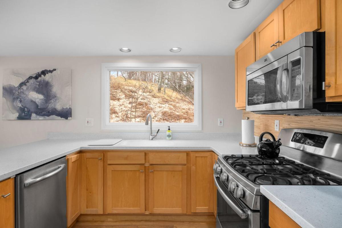 Lakefront House with Private Beach by Michigan Waterfront Luxury Properties - Housity