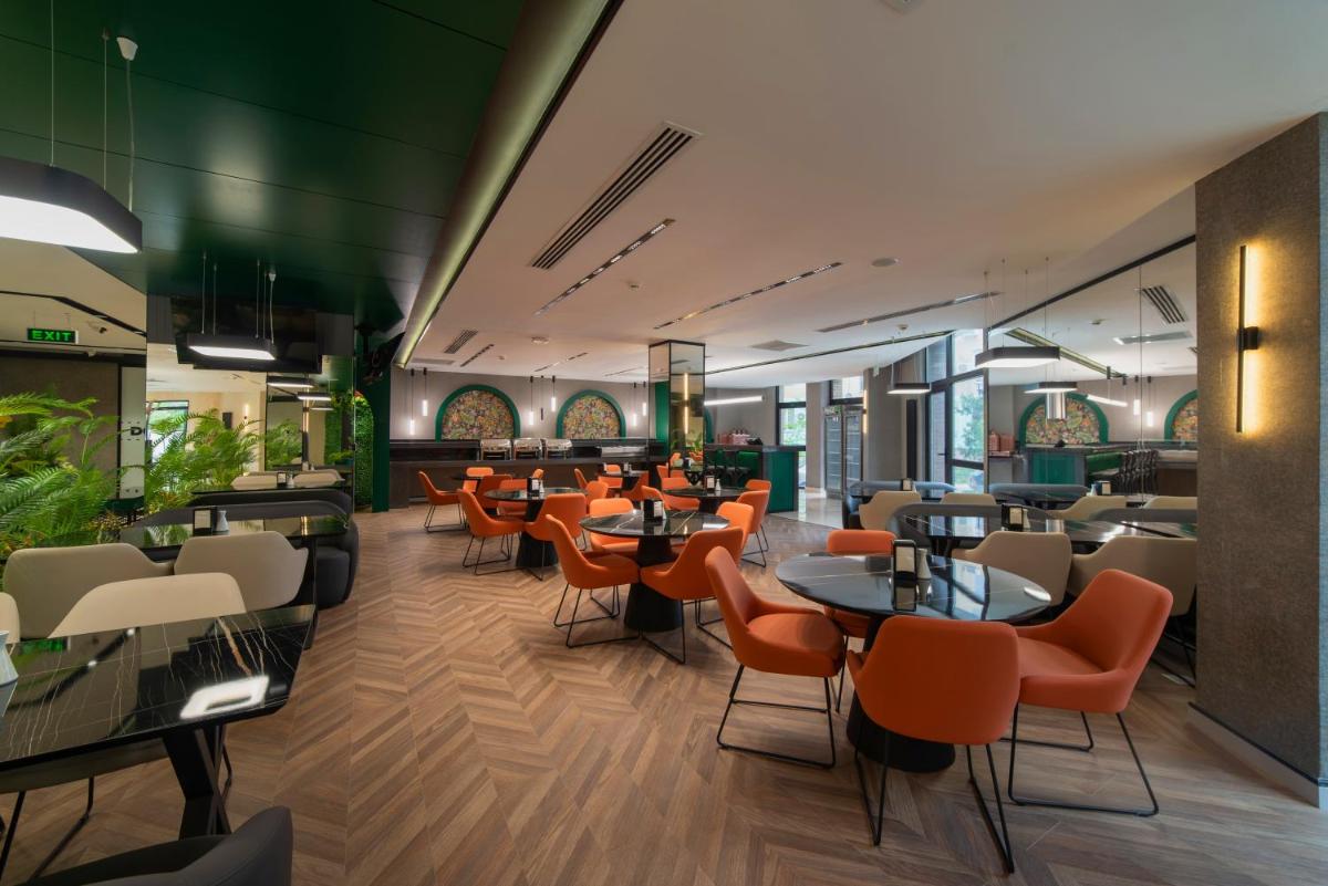 Dostyk Business Hotel - Housity