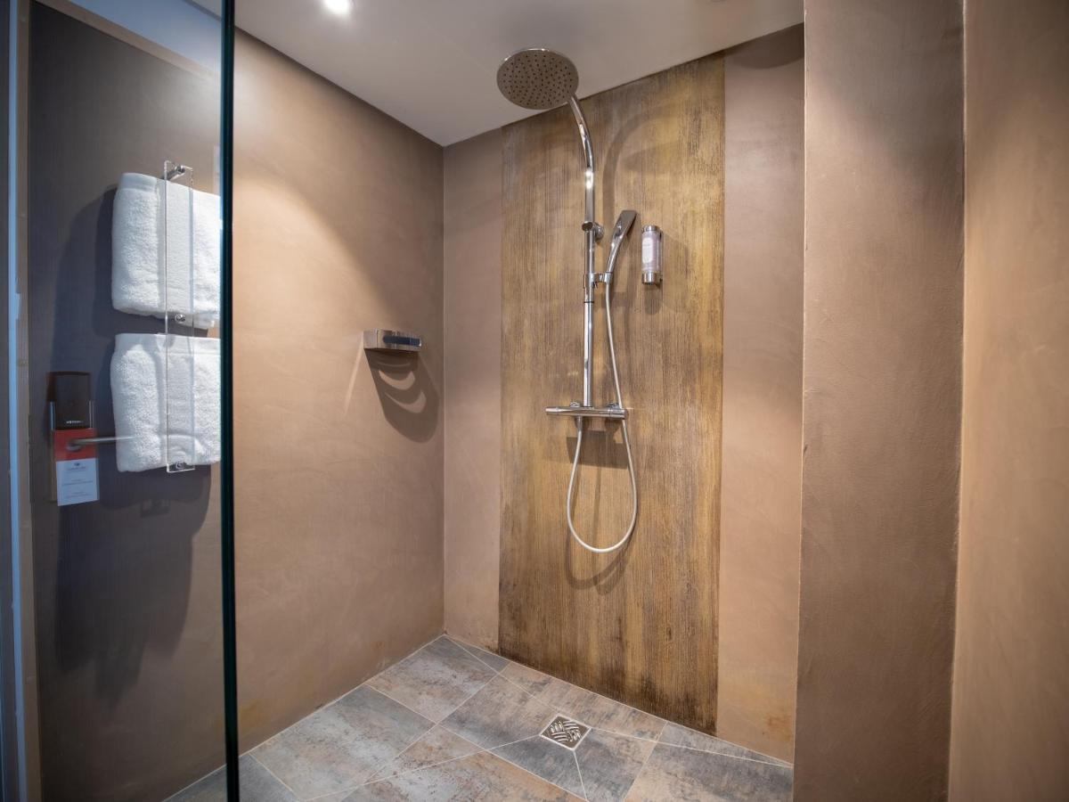 Salle de bains dans l'établissement Côté Thalasso Hôtel & Spa Marin