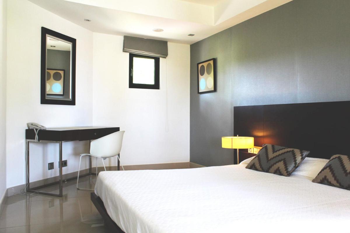 Uma cama ou camas num quarto em AP Adriana Beach Resort