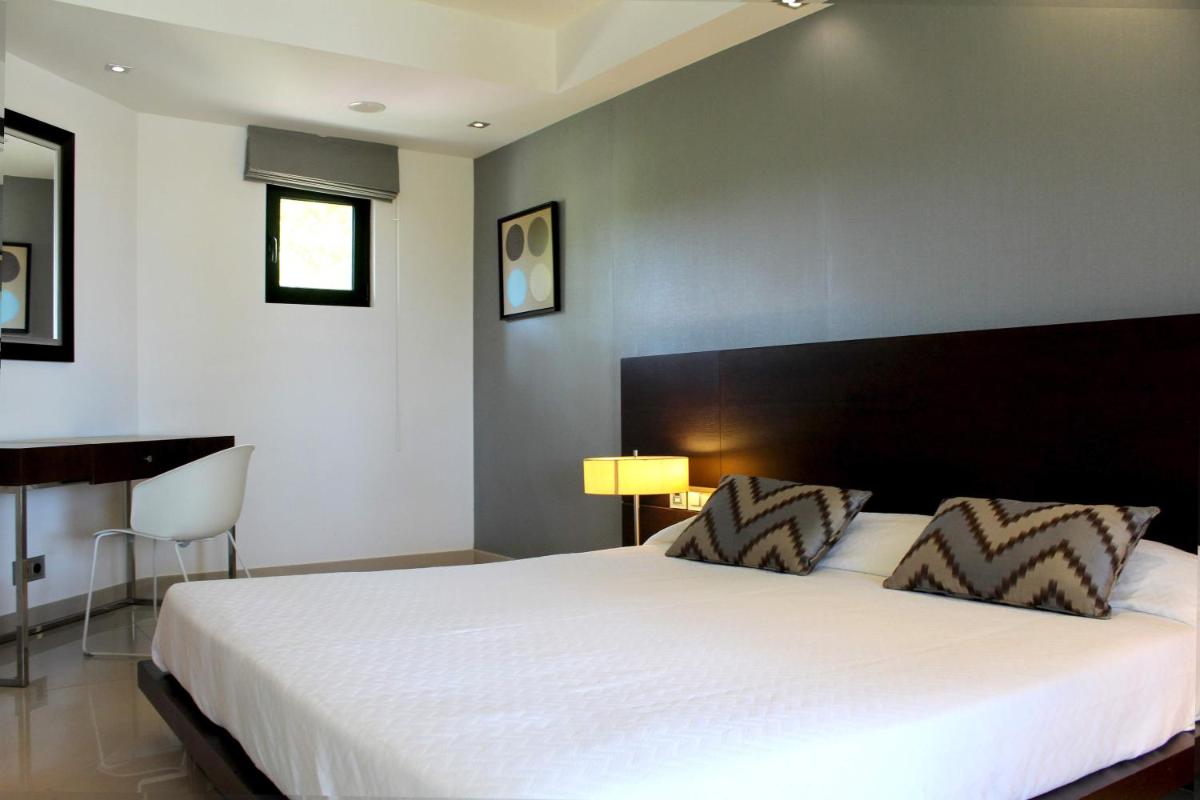 Uma cama ou camas num quarto em AP Adriana Beach Resort