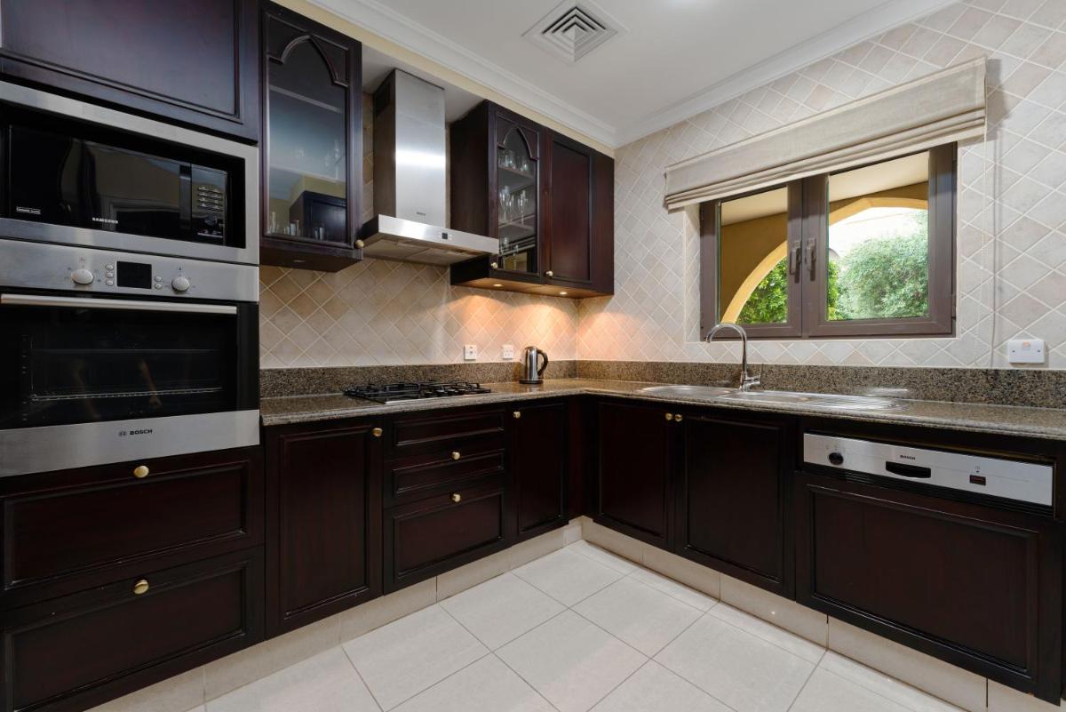 Maison Privee - Elite Apt Connected to Dubai Mall & Burj Khalifa - Housity