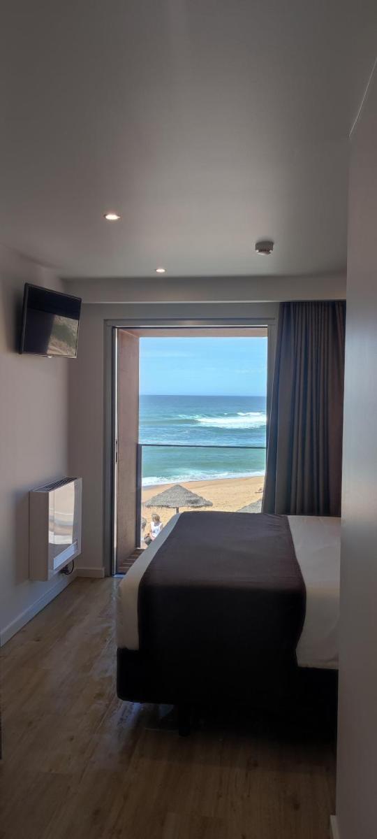 Uma cama ou camas num quarto em Promar - Eco Beach & Spa Hotel